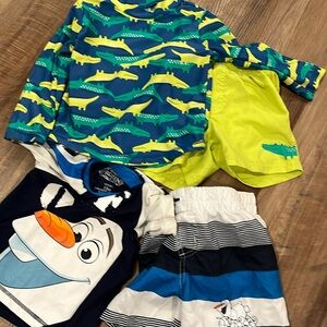 Boys swim shorts and rash guards Olaf and crocs